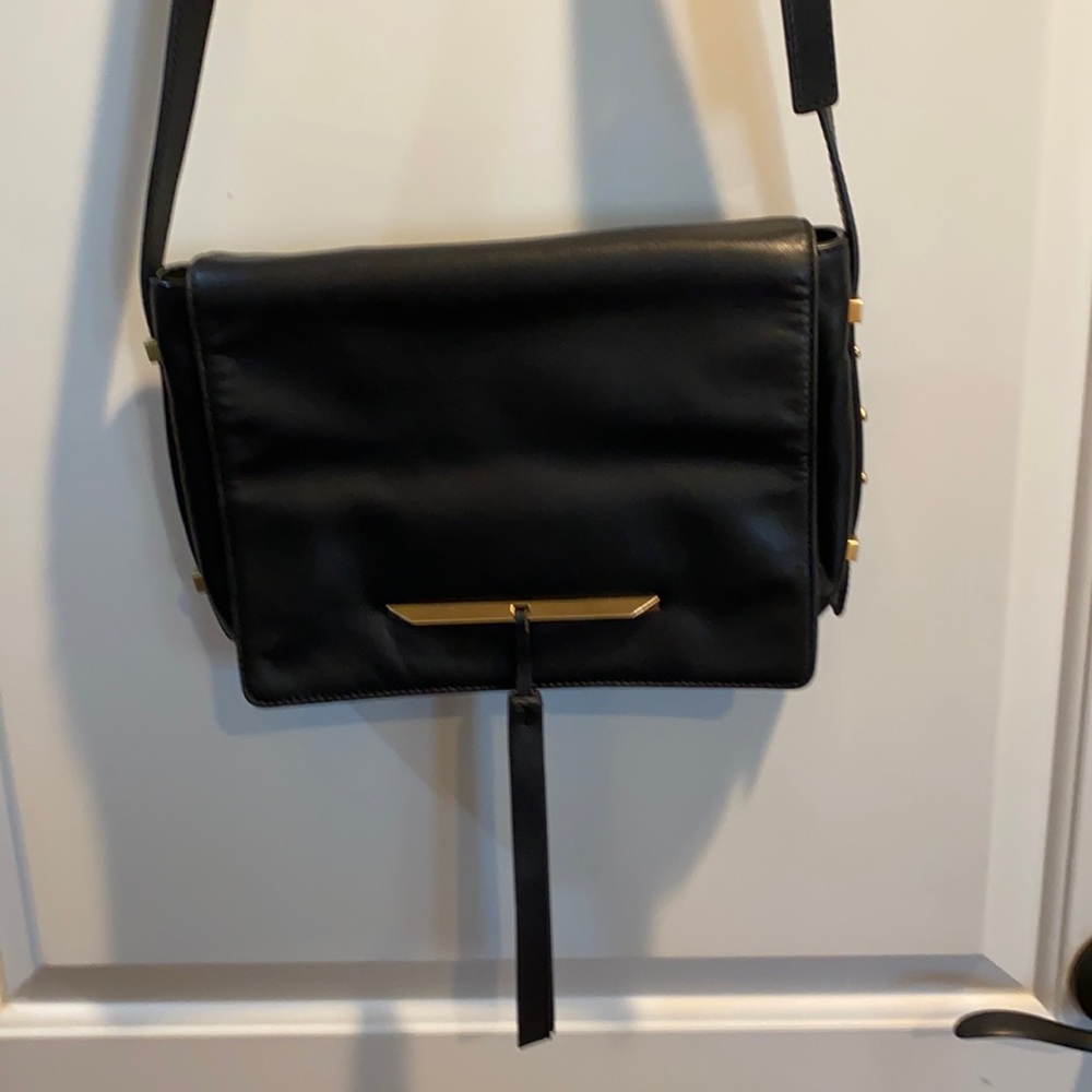Black color message purse byBrian ATwood